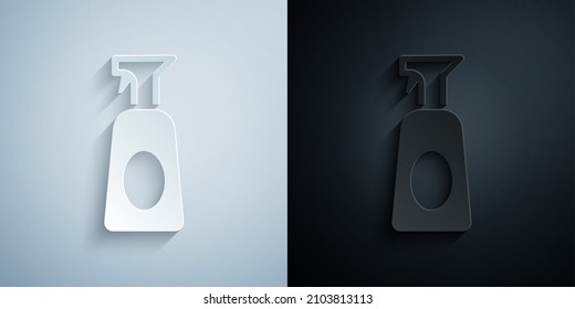Paper cut Cleaning spray bottle with detergent liquid icon isolated on grey and black background. Paper art style. Vector