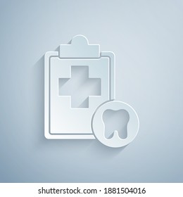 Paper cut Clipboard with dental card or patient medical records icon isolated on grey background. Dental insurance. Dental clinic report. Paper art style. Vector.
