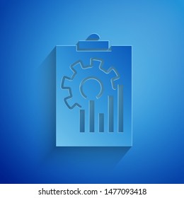 Paper cut Clipboard with graph chart icon isolated on blue background. Report text file icon. Accounting sign. Audit, analysis, planning. Paper art style. Vector Illustration