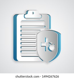 Paper cut Clipboard with medical clinical record pet icon isolated on grey background. Health insurance form. Medical check marks report. Paper art style. Vector Illustration