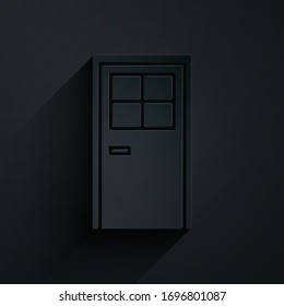 Icono de puerta cerrada cortada en papel aislado en fondo negro. Estilo de arte de papel. Ilustración vectorial
