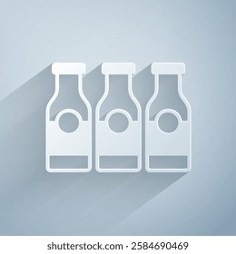 Paper cut Closed glass bottle with milk icon isolated on grey background. Paper art style. Vector