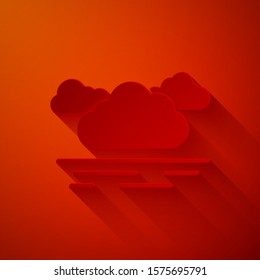 Paper cut Cloud icon isolated on red background. Paper art style. Vector Illustration