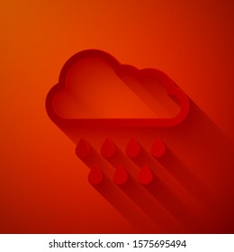Paper cut Cloud with rain icon isolated on red background. Rain cloud precipitation with rain drops. Paper art style. Vector Illustration
