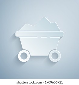 Paper cut Coal mine trolley icon isolated on grey background. Factory coal mine trolley. Paper art style. Vector Illustration