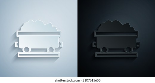 Paper cut Coal train wagon icon isolated on grey and black background. Rail transportation. Paper art style. Vector