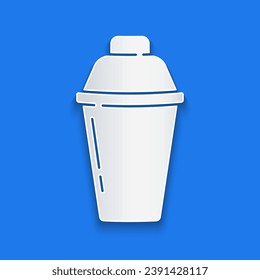 Paper cut Cocktail shaker icon isolated on blue background. Paper art style. Vector