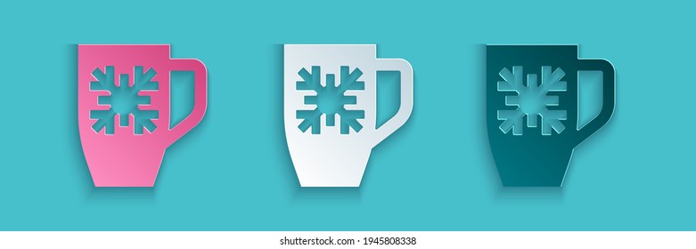 Paper cut Coffee cup with snowflake icon isolated on blue background. Tea cup. Hot drink coffee. Merry Christmas and Happy New Year. Paper art style. Vector