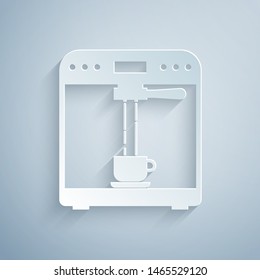 Paper cut Coffee machine and coffee cup icon isolated on grey background. Paper art style. Vector Illustration