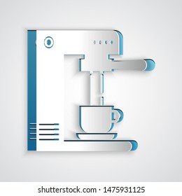 Paper cut Coffee machine and coffee cup icon isolated on grey background. Paper art style. Vector Illustration