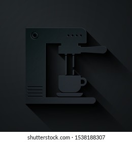 Paper cut Coffee machine and coffee cup icon isolated on black background. Paper art style. Vector Illustration