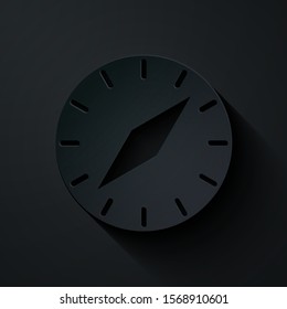 Paper cut Compass icon isolated on black background. Windrose navigation symbol. Wind rose sign. Paper art style. Vector Illustration