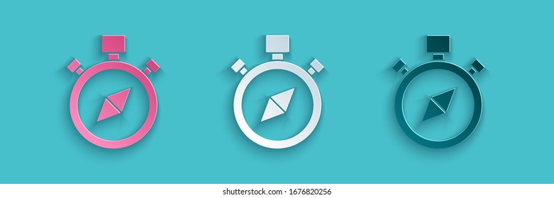Paper cut Compass icon isolated on blue background. Windrose navigation symbol. Wind rose sign. Paper art style. Vector Illustration