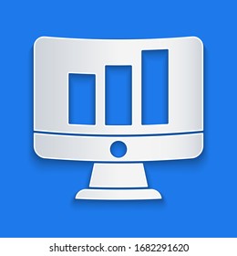 Paper cut Computer monitor with graph chart icon isolated on blue background. Report text file. Accounting sign. Audit, analysis, planning. Paper art style. Vector Illustration