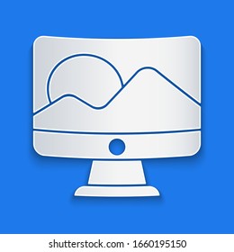 Paper cut Computer monitor screen icon isolated on blue background. Electronic device. Front view. Paper art style. Vector Illustration