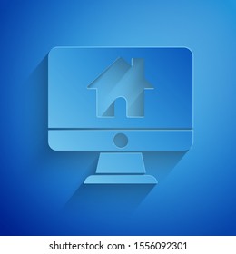 Paper cut Computer monitor with smart home icon isolated on blue background. Remote control. Paper art style. Vector Illustration