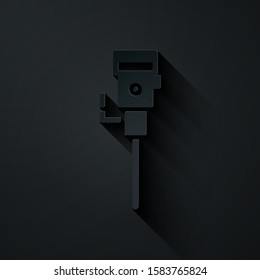 Paper cut Construction jackhammer icon isolated on black background. Paper art style. Vector Illustration