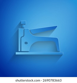 Paper cut Construction stapler icon isolated on blue background. Working tool. Paper art style. Vector Illustration