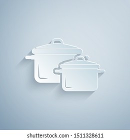 Paper cut Cooking pot icon isolated on grey background. Boil or stew food symbol. Paper art style. Vector Illustration