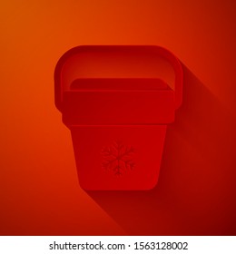Paper cut Cooler bag icon isolated on red background. Portable freezer bag. Handheld refrigerator. Paper art style. Vector Illustration