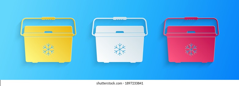 Paper cut Cooler bag icon isolated on blue background. Portable freezer bag. Handheld refrigerator. Paper art style. Vector.