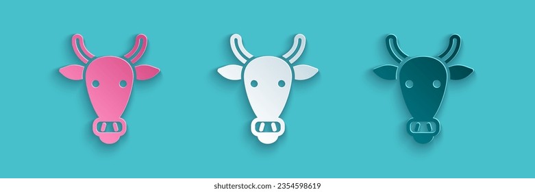 Paper cut Cow head icon isolated on blue background. Paper art style. Vector