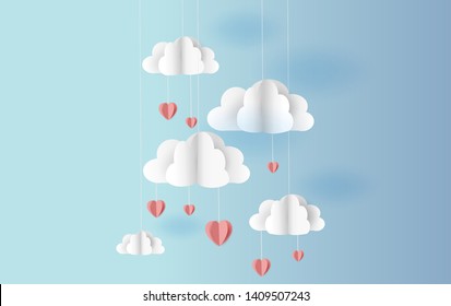 Paper cut and craft of Origami made mobile air balloon in a heart shape hang on blue sky.Valentine and summer season.Creative design holiday concept for graphic card and poster background.vector.EPS10