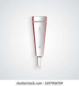 Paper cut Cream or lotion cosmetic tube icon isolated on grey background. Body care products for men. Paper art style. Vector Illustration