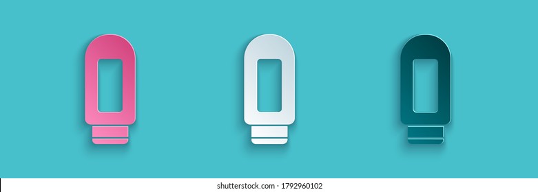 Paper cut Cream or lotion cosmetic tube icon isolated on blue background. Body care products for men. Paper art style. Vector Illustration