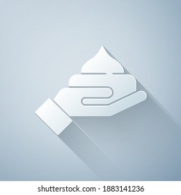 Paper cut Cream or lotion cosmetic tube icon isolated on grey background. Body care products for woman. Paper art style. Vector