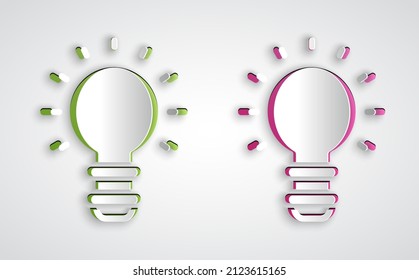 Paper cut Creative lamp light idea icon isolated on grey background. Concept ideas inspiration, invention, effective thinking, knowledge and education. Paper art style. Vector