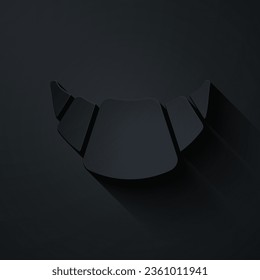 Paper cut Croissant icon isolated on black background. Paper art style. Vector