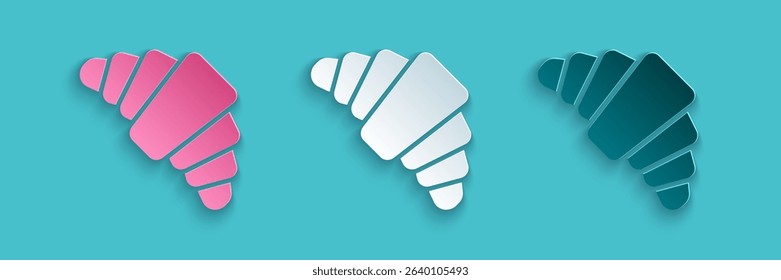 Paper cut Croissant icon isolated on blue background. Paper art style. Vector