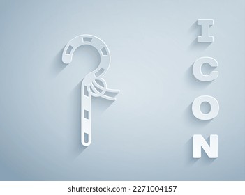 Paper cut Crook icon isolated on grey background. Ancient Egypt symbol. Scepters of egypt. Paper art style. Vector