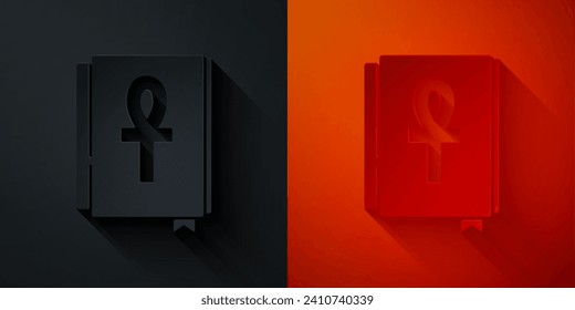 Paper cut Cross ankh book icon isolated on black and red background. Paper art style. Vector