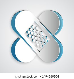 Paper cut Crossed bandage plaster icon isolated on grey background. Medical plaster, adhesive bandage, flexible fabric bandage. Paper art style. Vector Illustration