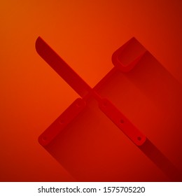 Paper cut Crossed fork and knife icon isolated on red background. BBQ fork and knife sign. Barbecue and grill tools. Paper art style. Vector Illustration