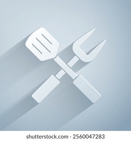 Paper cut Crossed fork and spatula icon isolated on grey background. BBQ fork and spatula sign. Barbecue and grill tools. Paper art style. Vector