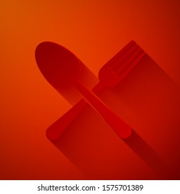 Paper cut Crossed fork and spoon icon isolated on red background. Cooking utensil. Cutlery sign. Paper art style. Vector Illustration