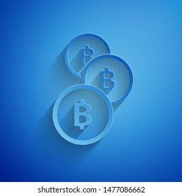 Paper cut Cryptocurrency coin Bitcoin icon isolated on blue background. Physical bit coin. Blockchain based secure crypto currency. Paper art style. Vector Illustration