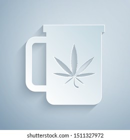Paper cut Cup tea with marijuana or cannabis leaf icon isolated on grey background. Marijuana legalization. Hemp symbol. Paper art style. Vector Illustration
