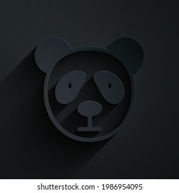 Paper cut Cute panda face icon isolated on black background. Animal symbol. Paper art style. Vector