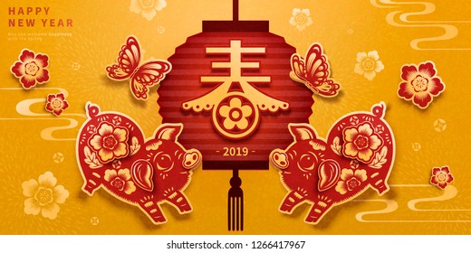 Paper cut cute piggy new year banner with spring word written in Chinese characters on spring couplet, yellow and red tone Paper cut cute piggy new year banner with spring word written in Chinese characters on spring couplet, yellow and red tone