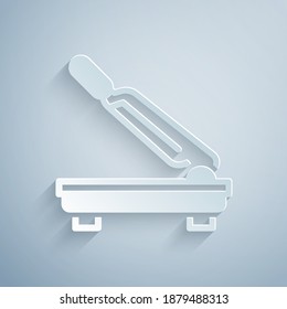 Paper cut Paper cutter icon isolated on grey background. Paper art style. Vector.