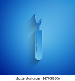 Paper cut Cutter tool icon isolated on blue background. Sewing knife with blade. Paper art style. Vector Illustration