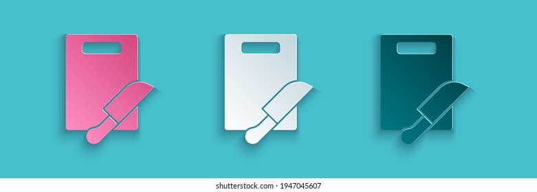 Paper cut Cutting board and knife icon isolated on blue background. Chopping Board symbol. Cutlery symbol. Paper art style. Vector