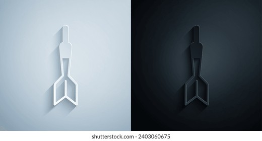 Paper cut Dart arrow icon isolated on grey and black background. Paper art style. Vector