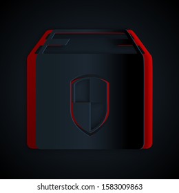 Paper cut Delivery pack security symbol with shield icon isolated on black background. Delivery insurance. Insured cardboard boxes beyond the shield. Paper art style. Vector Illustration