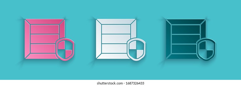 Paper cut Delivery pack security with shield icon isolated on blue background. Delivery insurance. Insured cardboard boxes beyond the shield. Paper art style. Vector Illustration