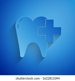 Paper cut Dental clinic for dental care tooth icon isolated on blue background. Paper art style. Vector Illustration